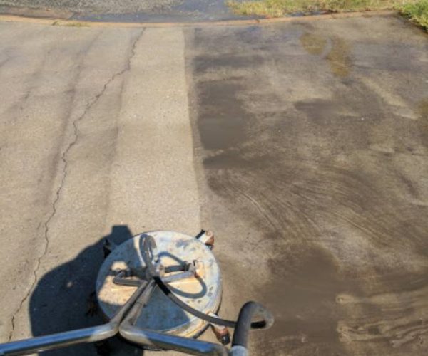 pressure washing machine cleaning concrete before and after